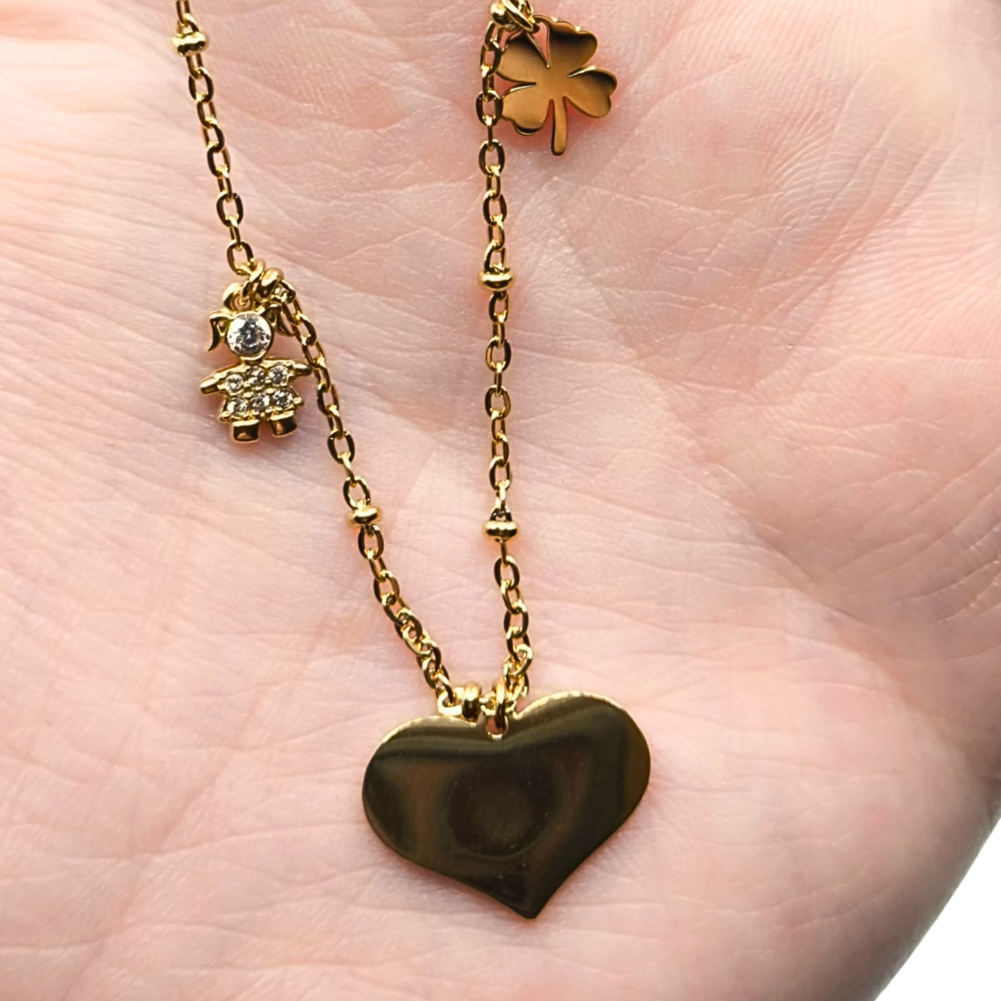 Collana Cuore con Ciondoli Portafortuna – Eleganza e Significato