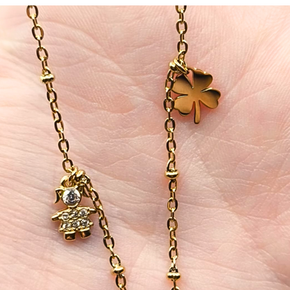 Collana Cuore con Ciondoli Portafortuna – Eleganza e Significato