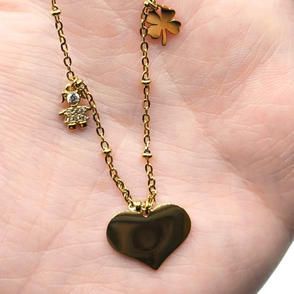 Collana Cuore con Ciondoli Portafortuna – Eleganza e Significato